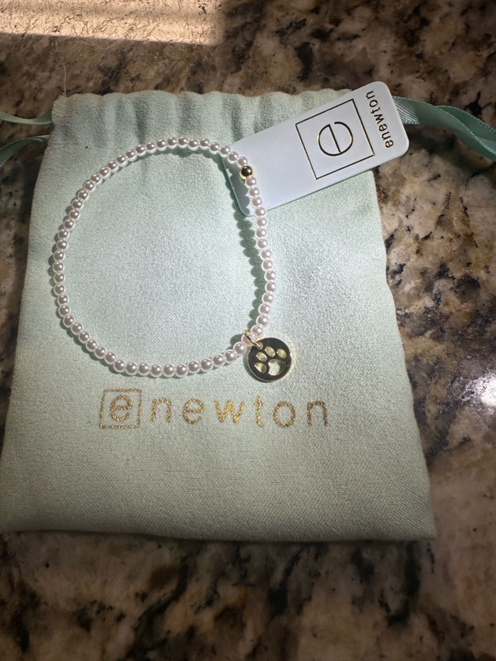 enewton White Pearl Stretch Bracelet with Gold Paw Charm